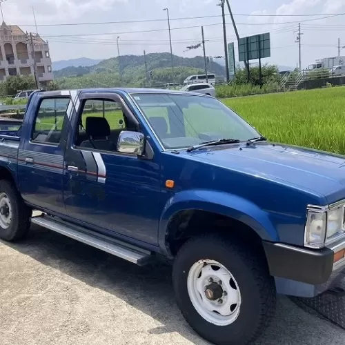 日産ダットサン ’92y ブルーのサムネイル
